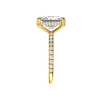 Radiant cut moissanite ring showing pave diamond band detail