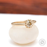 Light champagne moissanite solitaire ring crown prong setting detail