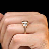 Emerald cut champagne moissanite ring side view baguette accents