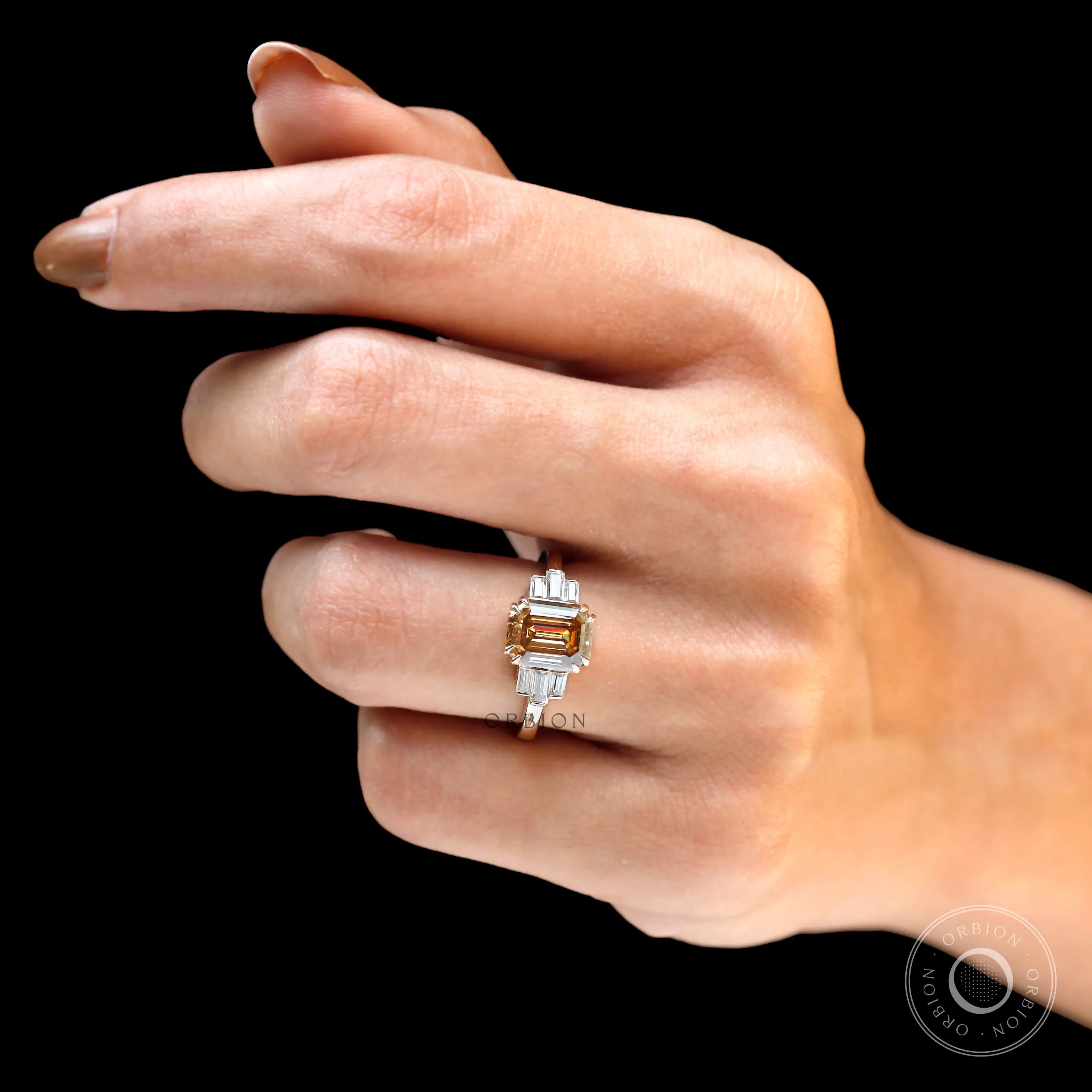 Luxury champagne moissanite engagement ring with yellow gold band