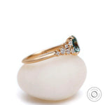 Side profile of oval moissanite cluster ring