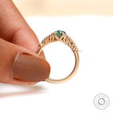 Yellow gold oval cluster engagement ring