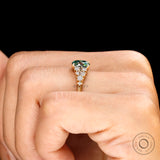 Oval colored moissanite ring with round accent stones