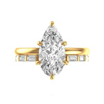 Pear old mine cut moissanite ring set with baguette open cuff band in yellow gold