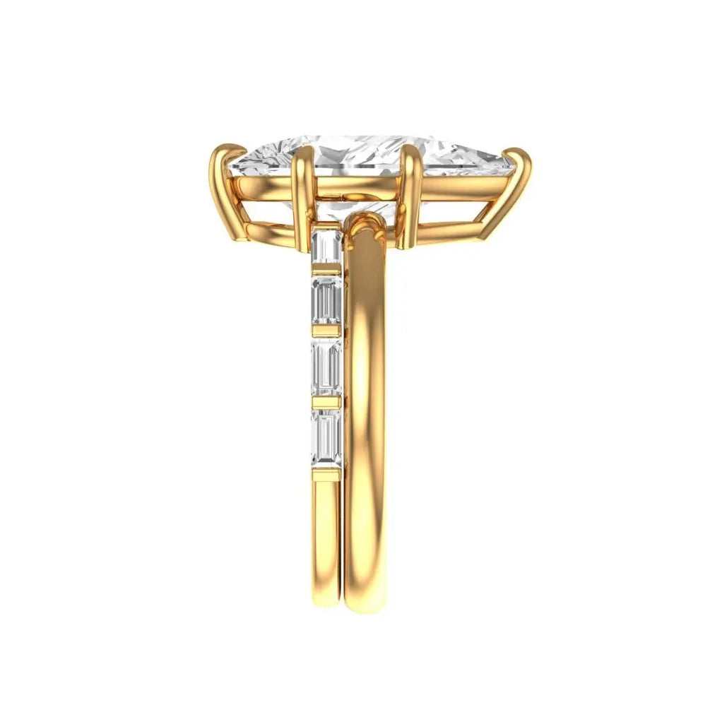 Open cuff baguette band paired with pear solitaire ring