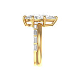 Open cuff baguette band paired with pear solitaire ring
