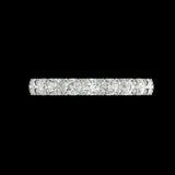 Top view of 3/4 eternity round moissanite band on black background.