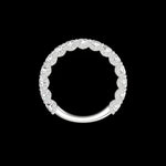Overhead circle view pave round moissanite stacking band on black background.