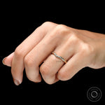 Angled close-up of starburst-inspired curved chevron stacking band.