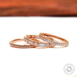 Layered trio bands showing twisted, pave, baguette details