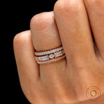 On-hand close-up of trio wedding set stack