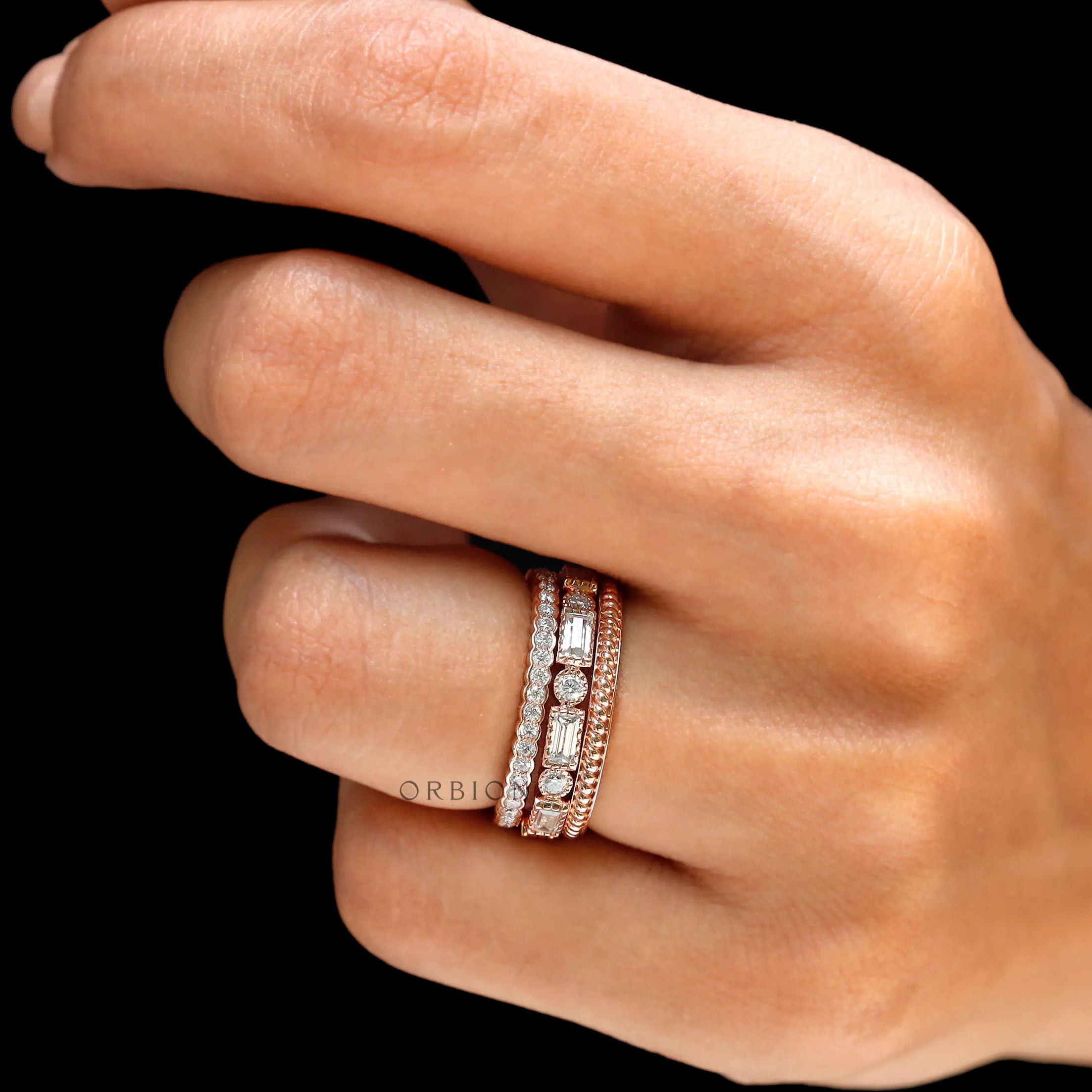 Side profile on-hand showing raised stone band stack
