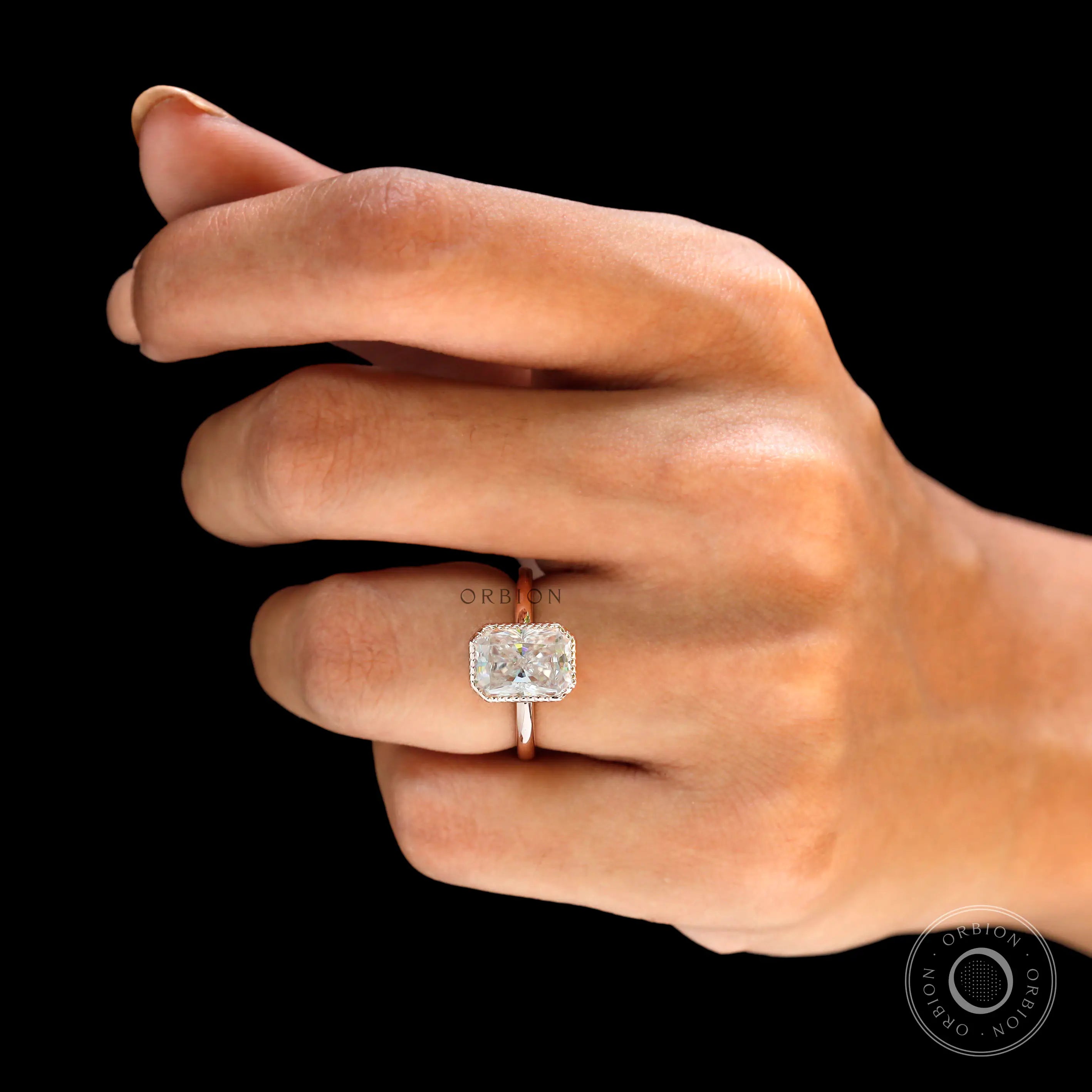 Rose gold radiant bezel engagement ring