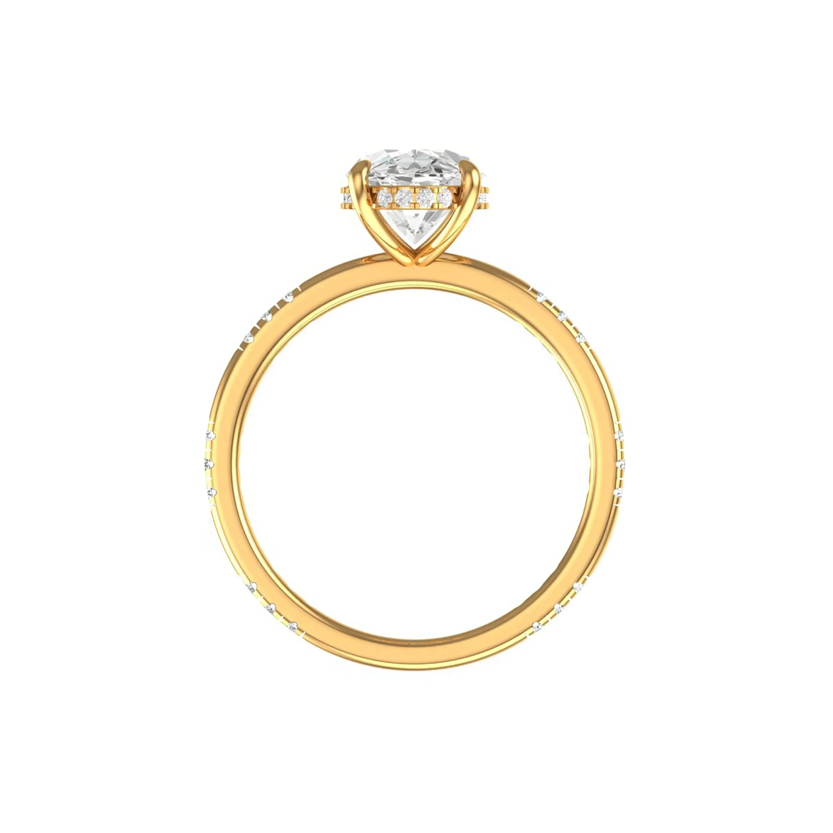 Side profile oval ring with hidden halo in yellow gold on white background