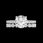 Front view round moissanite solitaire with matching diamond bands