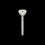 Side profile of round solitaire ring with accented band