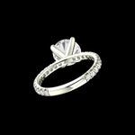 Back angled view of round solitaire ring in white gold