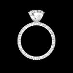 Side profile of round solitaire showing cathedral prongs