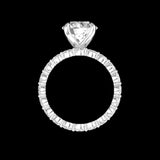 Side profile of round solitaire showing cathedral prongs