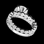 Underside angle highlighting open gallery and scalloped diamond band