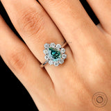 Vintage inspired pear halo moissanite ring close up