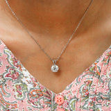 Timeless white gold solitaire pendant