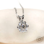 Round old European cut solitaire pendant in white gold