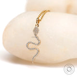 Pave serpent pendant in solid 18k yellow gold