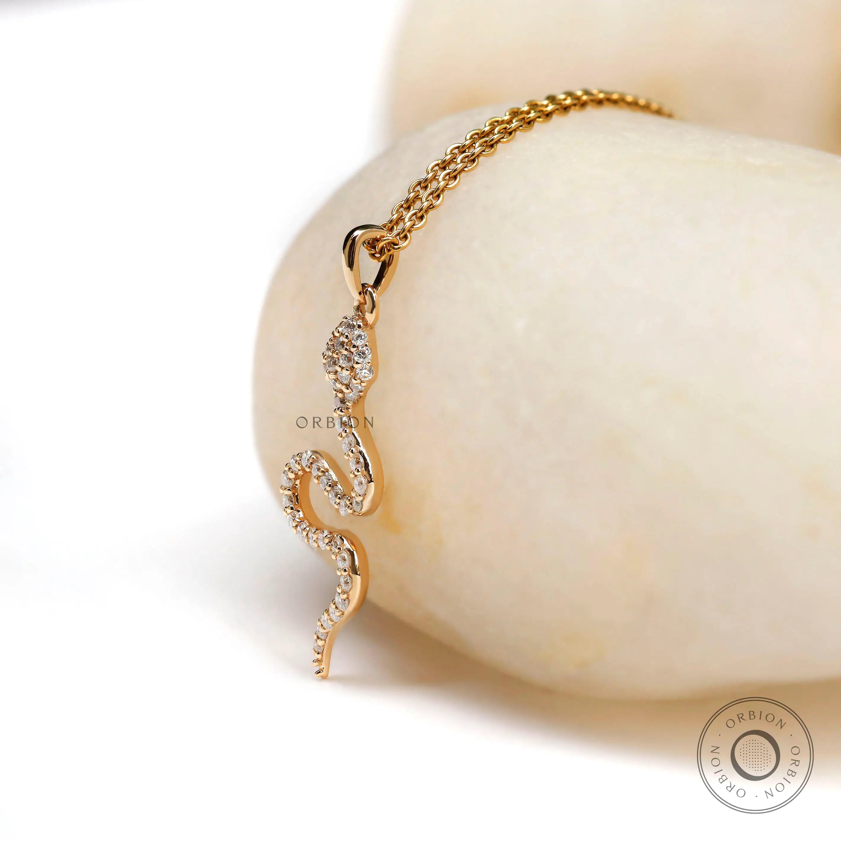 Diamond studded snake pendant charm