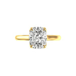 Front view of tulip-set elongated cushion moissanite cathedral solitaire ring.