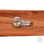 Close-up of the side profile of the Moissanite ring, highlighting the prong setting and band design