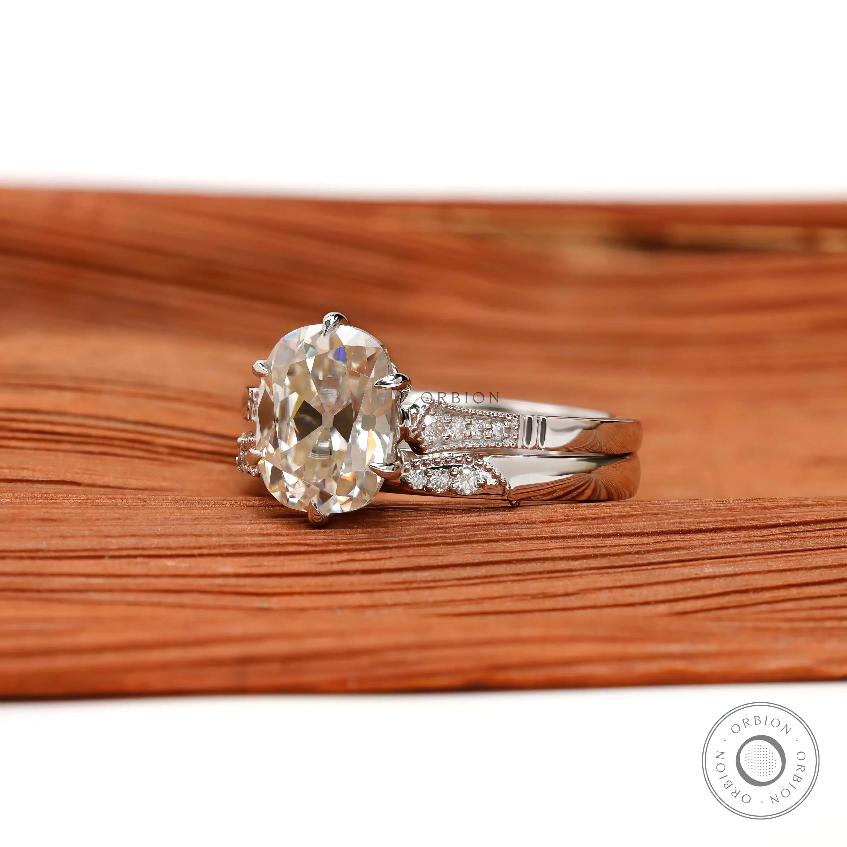 Close-up of the side profile of the Moissanite ring, highlighting the prong setting and band design