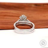 View of the back of the elongated cushion Moissanite ring, showing the detailed shank and side stones