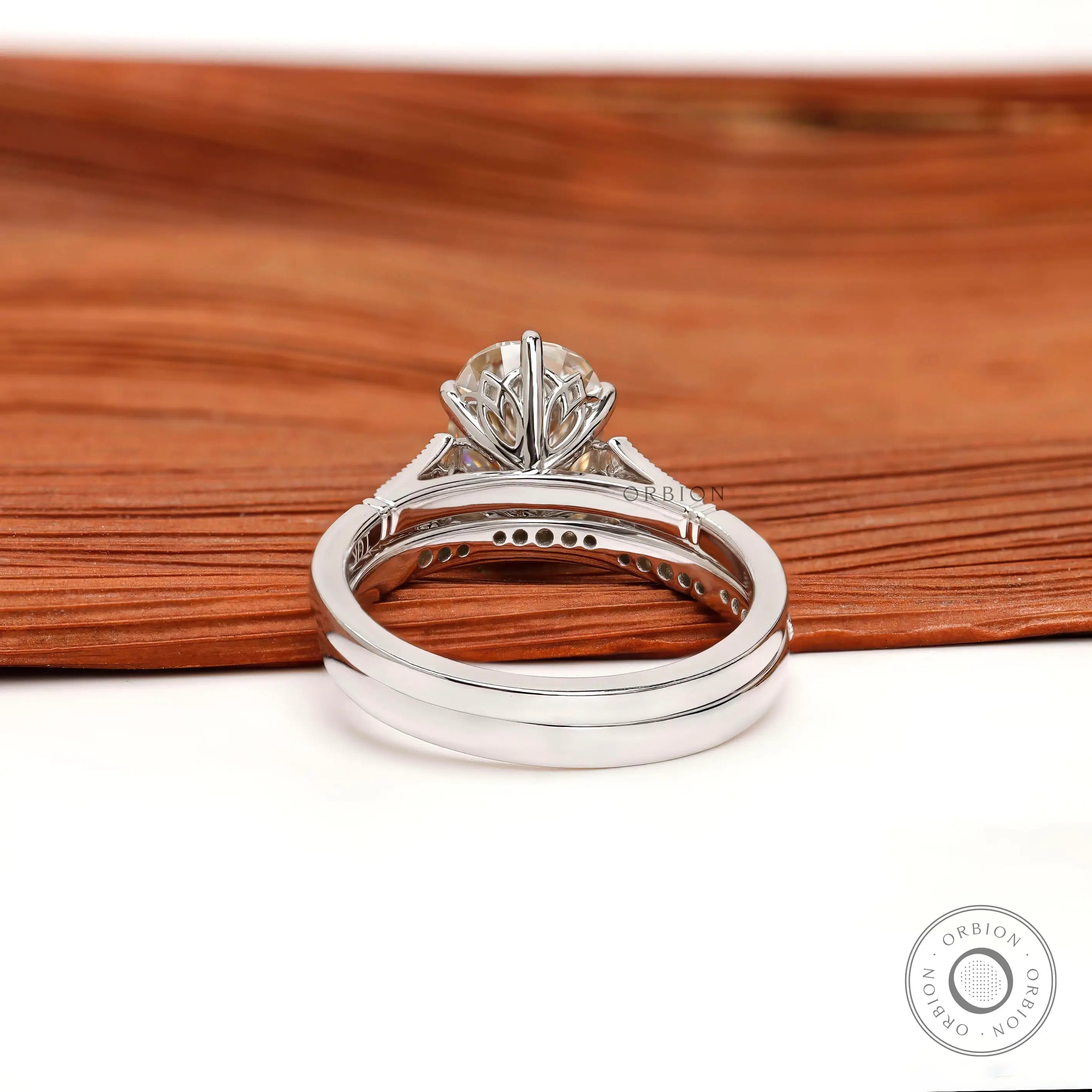View of the back of the elongated cushion Moissanite ring, showing the detailed shank and side stones