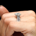 Moissanite ring being worn on a finger, showing its elegant design and perfect fit