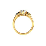 Side profile showing crown prongs and tapered 10K yellow gold band.