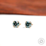 Vintage style round moissanite studs in yellow gold