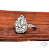 Rear view of pear diamond halo ring showing undergallery details