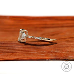 Multi shaped accent engagement ring with baguette and round diamonds