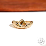 Chunky pear moissanite ring with bold yellow gold band