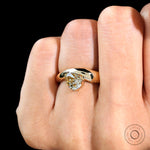 Front view of unique chunky pear moissanite solitaire ring