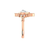 Vintage inspired Art Deco pear engagement ring with milgrain cluster halo