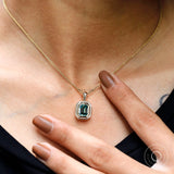 Emerald cut blue green moissanite bezel set pendant