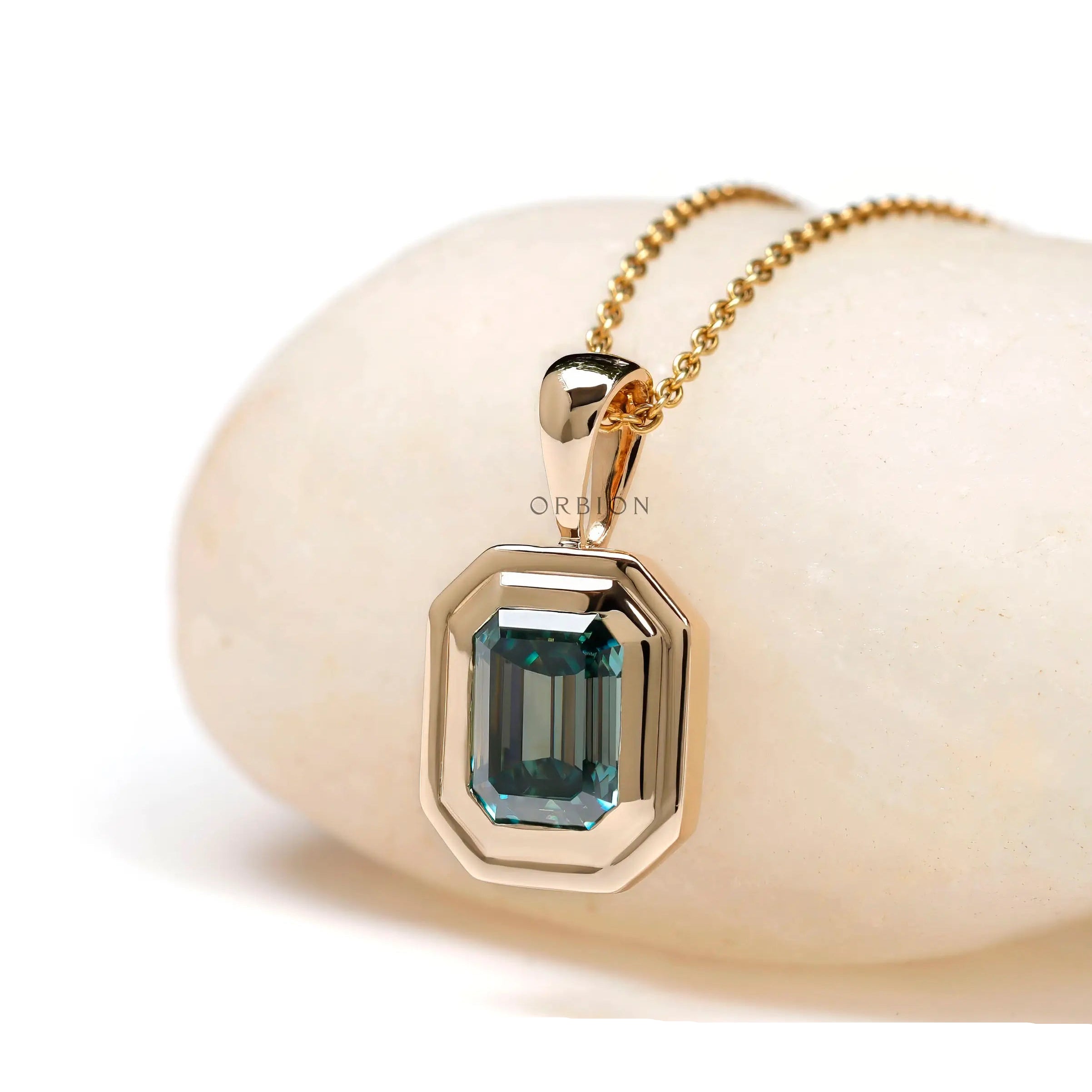 Modern vintage emerald cut moissanite necklace detail shot