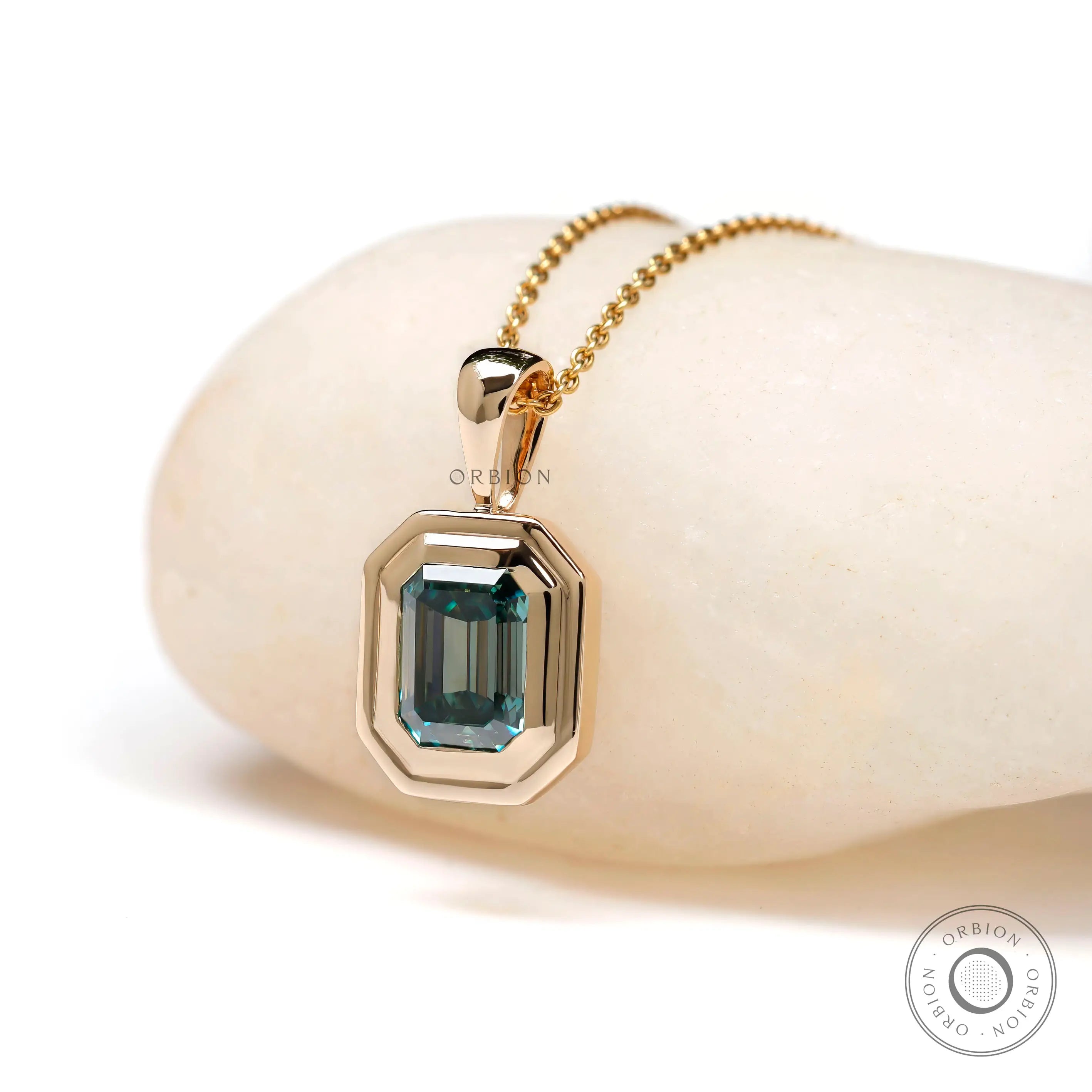Modern vintage emerald cut moissanite necklace detail shot