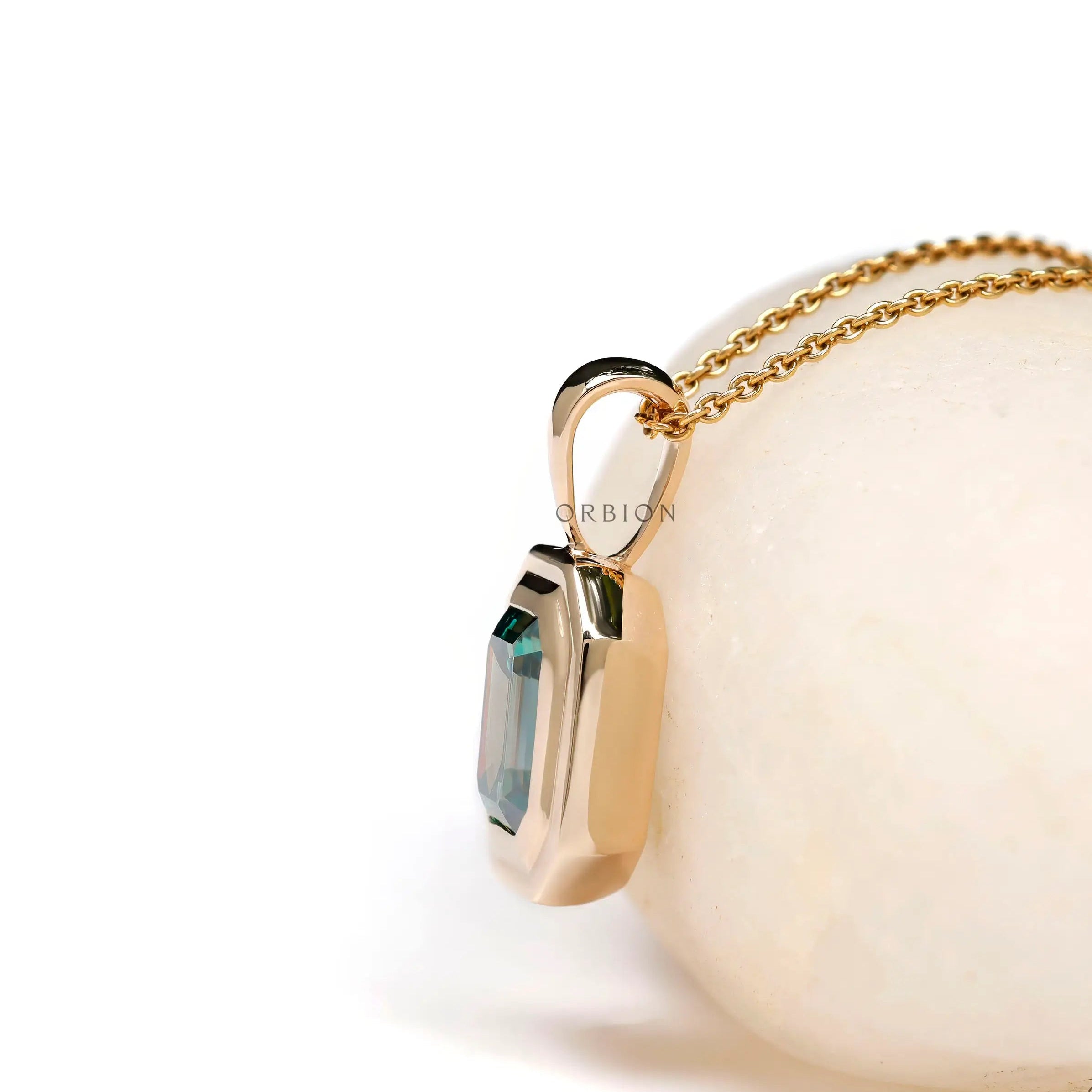 Emerald cut teal moissanite bezel pendant necklace 