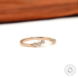 Unique open curved diamond band, angled perspective showing diamond clusters