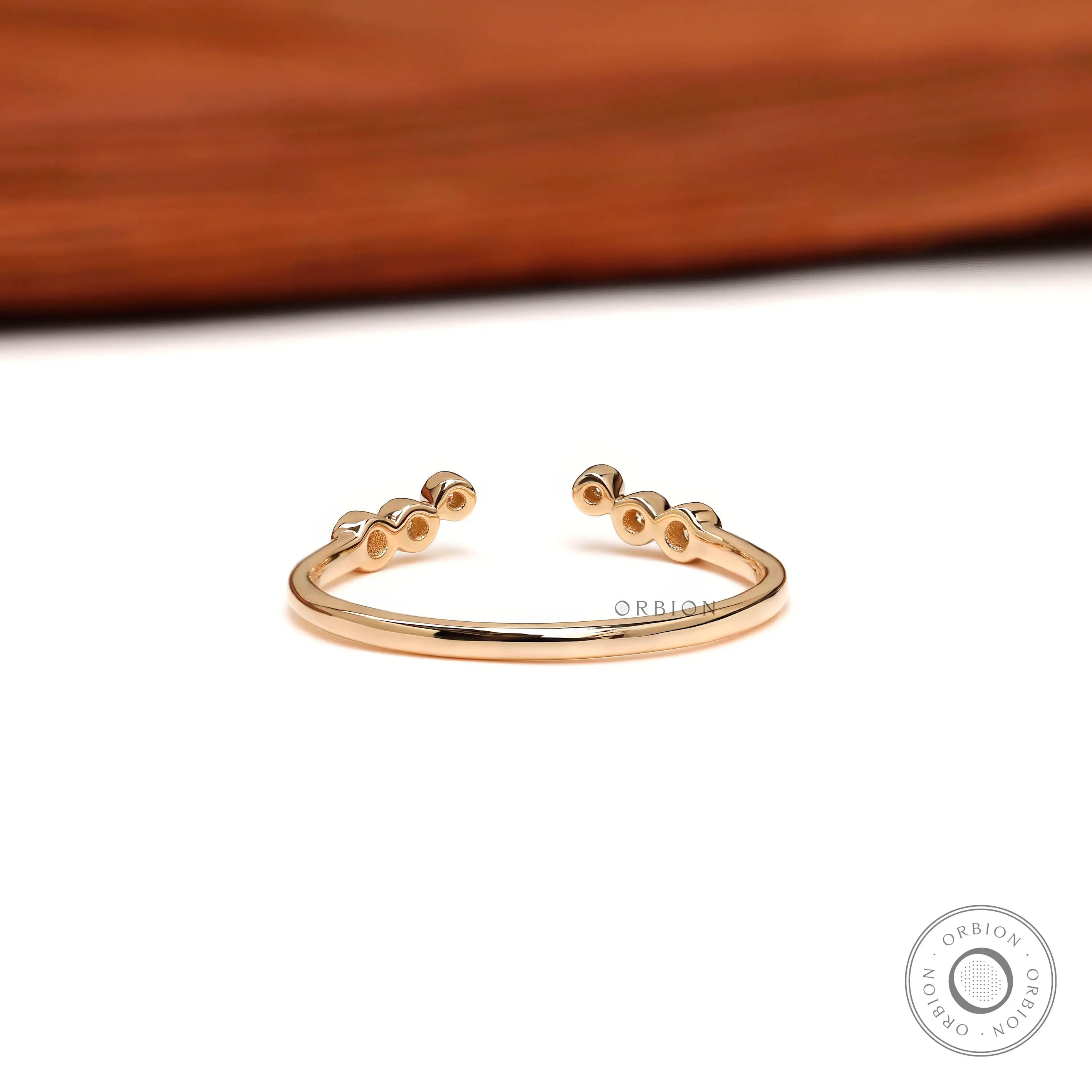 Open back view of curved stacking ring in 14K yellow gold