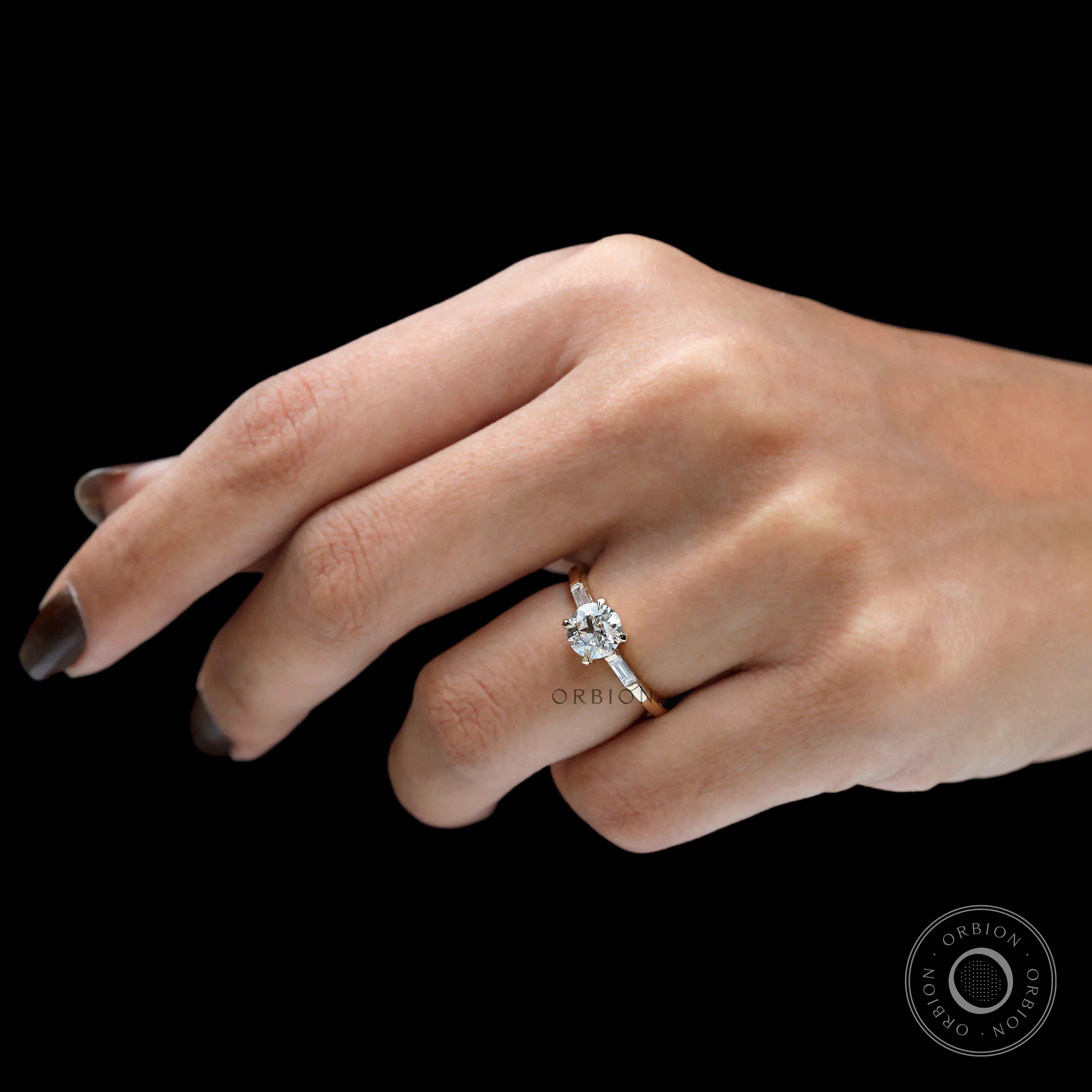Old European cut moissanite engagement ring on hand