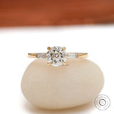 Old European cut three stone engagement ring in 14K yellow gold front view